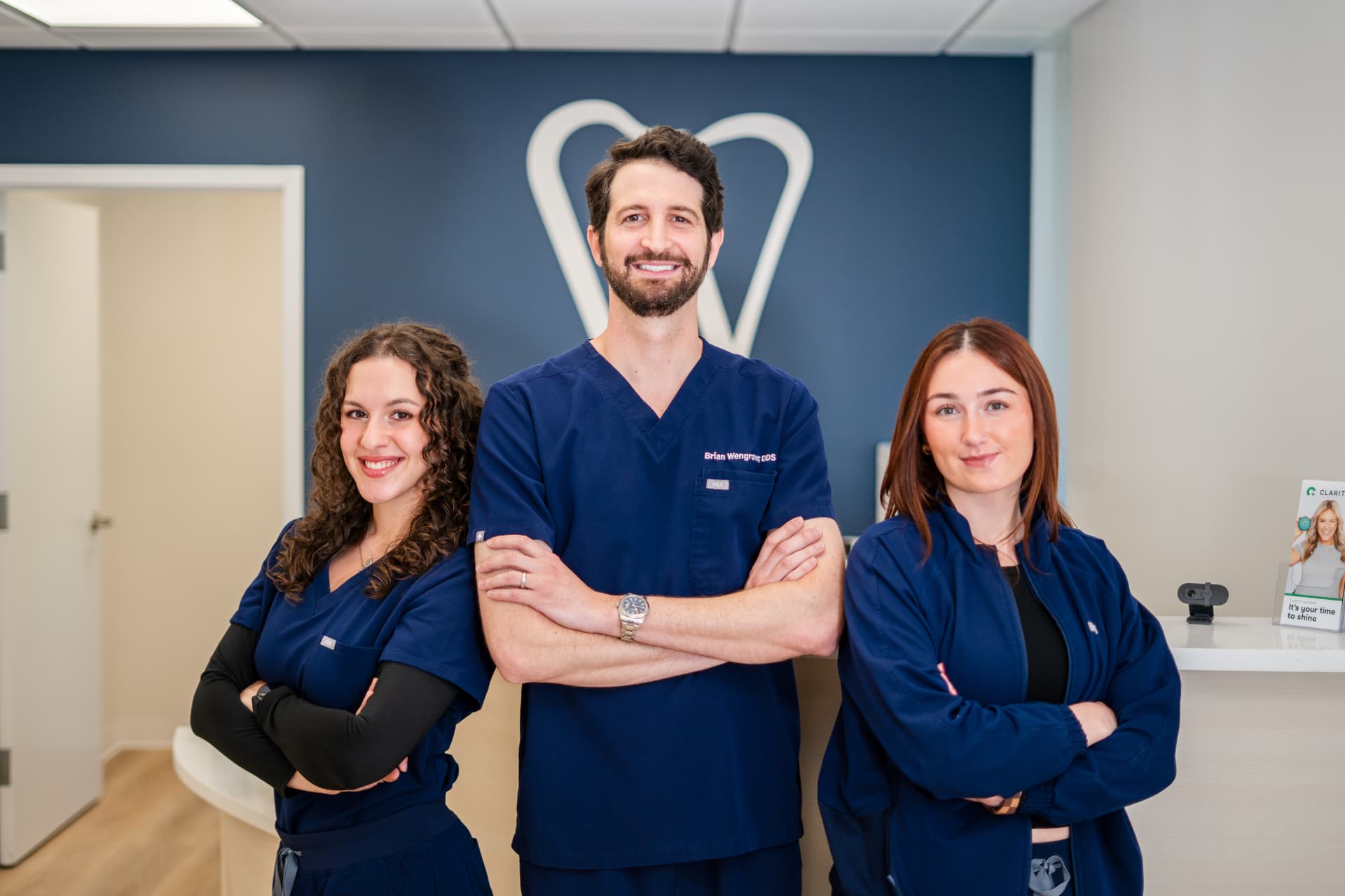 Wengrover Dental Arts doctor and team standing in the practice reception